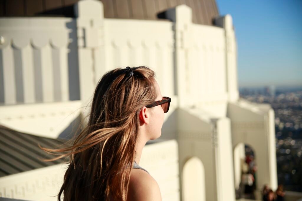 Kara looks out onto the view of Los Angeles from Griffith Observatory